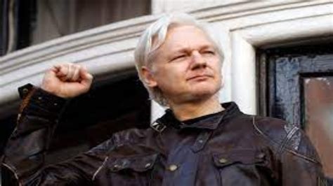 what is julian assange wanted for